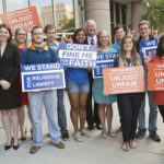 Houston Baptist University students stand with Becket Fund attorneys in April after oral argument before the Fifth Circuit Court of Appeals. (Photo: The Becket Fund for Religious Liberty)