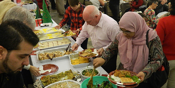 Refugees share Christmas meal at Dallas church