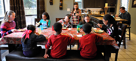 Strange family at the dinner table