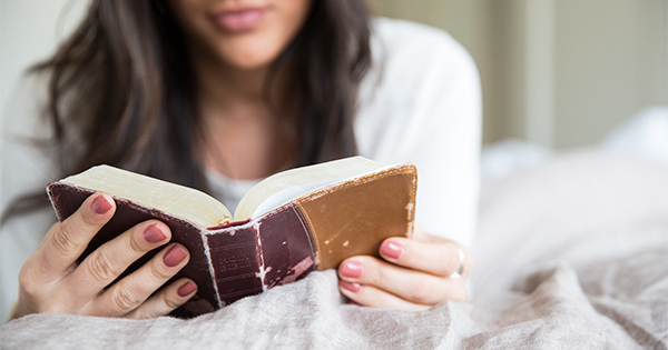 woman reading Bible