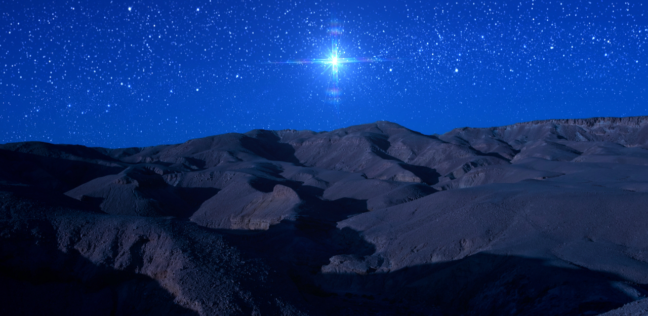 bright_star_over_desert_landscape_night